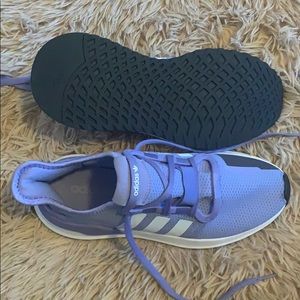 Adidas women’s tennis shoe.